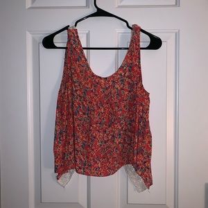 Floral tank top with cute crossed back